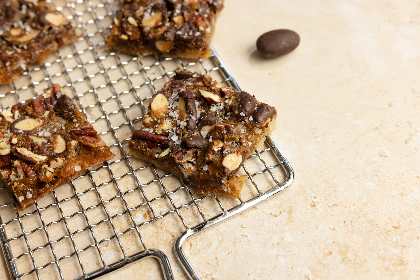 close-up-sliced-chocolate-pecan-bars-with-flaky-salt